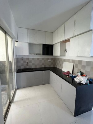 Kitchen in 2 BHK Apartment at Shivam 19 Grand West, Thergaon – for Rent