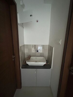 Bathroom in 2 BHK Apartment at Shivam 19 Grand West, Thergaon – for Rent