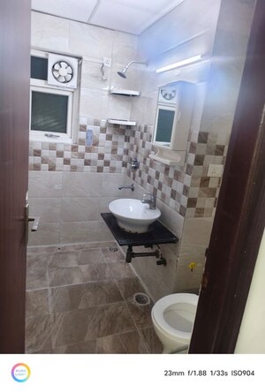 Bathroom in 2 BHK Apartment at Aims Golf City, Sector 75 – for Rent