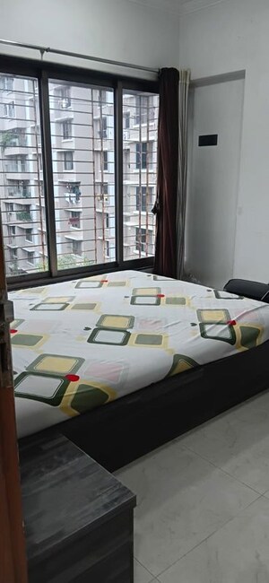 Bedroom in 2 BHK Apartment at Sangita Aspire, Vile Parle East – for Rent