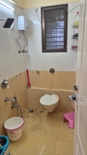 Bathroom in 2 BHK Apartment at Kopar Khairane – for Sale