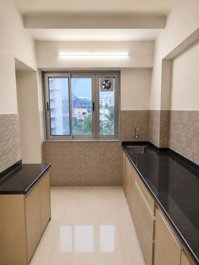 Kitchen, naman-premier 2 Bedroom 577 Sq.Ft. Apartment In Andheri East Mumbai 10584062
