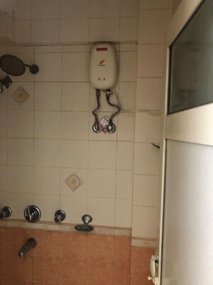 Bathroom in 2 BHK Apartment at Lok Darshan, Andheri East – for Rent
