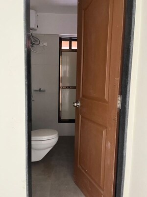 Bathroom in 2 BHK Apartment at Pratham Prerana CHS, Andheri West – for Rent