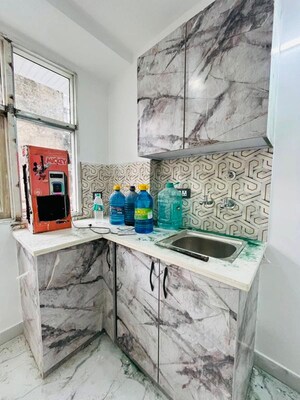 Kitchen in 1 RK Apartment at Freedom Fighters Enclave – for Rent