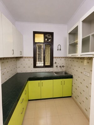 Kitchen in 2 BHK Apartment at Freedom Fighters Enclave – for Rent