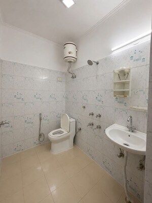 Bathroom in 2 BHK Apartment at Freedom Fighters Enclave – for Rent