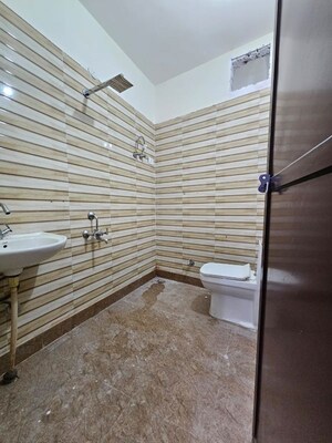 Bathroom in 2 BHK Apartment at Freedom Fighters Enclave – for Rent