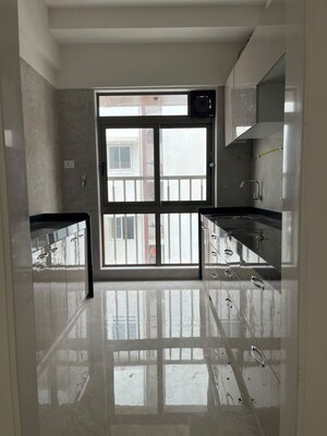 Kitchen in 2 BHK Apartment at Crystal Hitendra Dhamm Shabha CHS, Goregaon West – for Rent