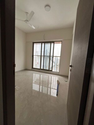 Bedroom in 2 BHK Apartment at Crystal Hitendra Dhamm Shabha CHS, Goregaon West – for Rent