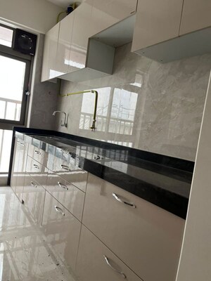 Kitchen in 2 BHK Apartment at Crystal Hitendra Dhamm Shabha CHS, Goregaon West – for Rent