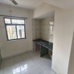 Kitchen in 3 BHK Apartment at Green Acres II CHS Ltd, Ghodbunder Road – for Rent