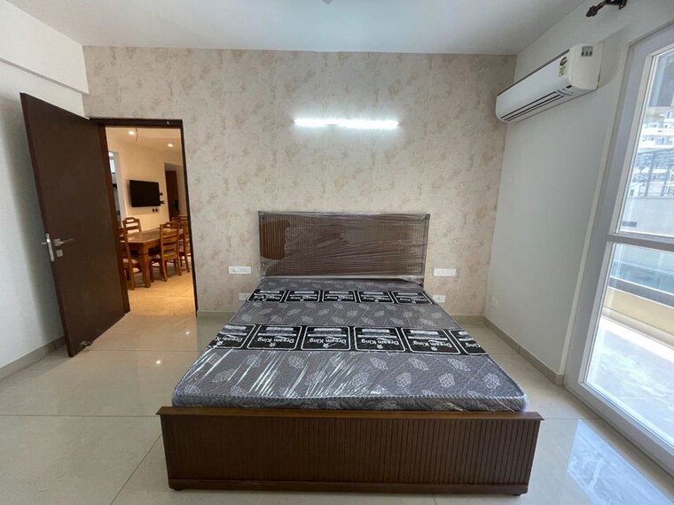 Bedroom, maya-green-lotus-utsav 3 Bedroom 1950 Sq.Ft. Apartment In International Airport Road Zirakpur 10584395