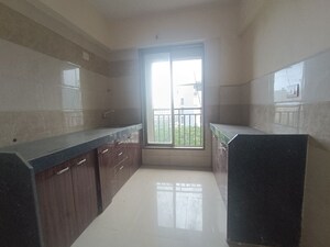 Kitchen in 2 BHK Apartment at Kauls Heritage City Apartment, Vasai West – for Sale