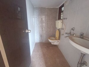 Bathroom in 2 BHK Apartment at Kauls Heritage City Apartment, Vasai West – for Sale