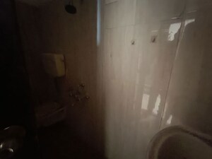 Bathroom in 2 BHK Apartment at Kauls Heritage City Apartment, Vasai West – for Sale