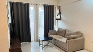 Living Room in 2 BHK Apartment at Kohinoor Tinsel County, Hinjewadi – for Rent