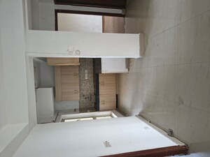 Kitchen in 2.5 BHK Apartment at Nimbus The Golden Palm, Sector 168 – for Rent