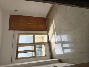 Kitchen in 2.5 BHK Apartment at Nimbus The Golden Palm, Sector 168 – for Rent