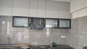 Kitchen in 4 BHK Apartment at Godrej Garden City Pinecrest, Jagatpur – for Rent