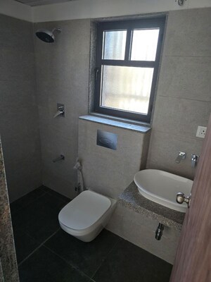 Bathroom in 4 BHK Apartment at Godrej Garden City Pinecrest, Jagatpur – for Rent