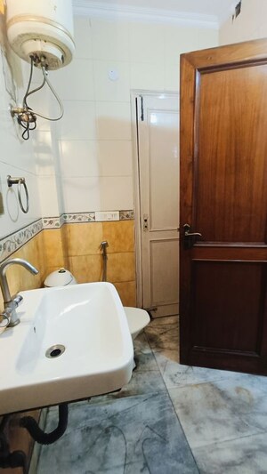 Bathroom in 3 BHK Builder Floor at Malviya Nagar – for Rent