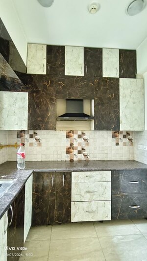 Kitchen in 2 BHK Apartment at Gaur City 7th Avenue, Sector 4 Greater Noida – for Rent