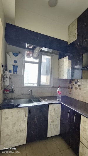 Kitchen in 2 BHK Apartment at Gaur City 7th Avenue, Sector 4 Greater Noida – for Rent