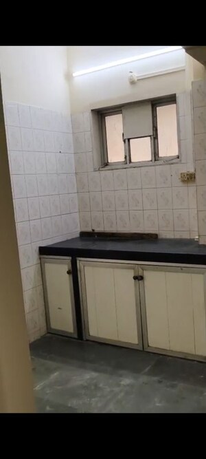 Kitchen in 1 BHK Apartment at Shree Ram Sadan Apartment, Vile Parle East – for Rent