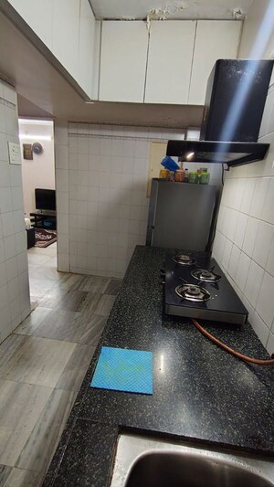 Kitchen in 1 BHK Apartment at Harmony CHS Powai, Powai – for Sale