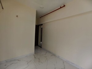 Room in 1.5 BHK Apartment at Royal Eksar Apartment, Borivali West – for Sale