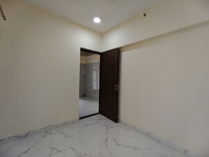 Room in 1.5 BHK Apartment at Royal Eksar Apartment, Borivali West – for Sale
