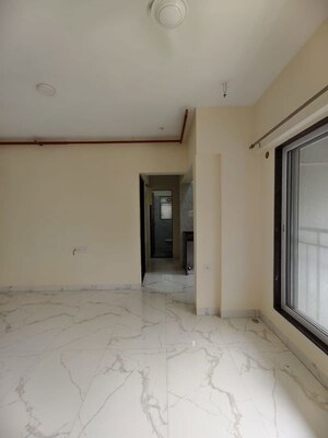 Room in 1.5 BHK Apartment at Royal Eksar Apartment, Borivali West – for Sale