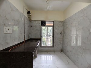 Room in 1.5 BHK Apartment at Royal Eksar Apartment, Borivali West – for Sale