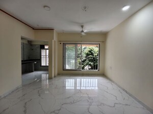 Room in 1.5 BHK Apartment at Royal Eksar Apartment, Borivali West – for Sale