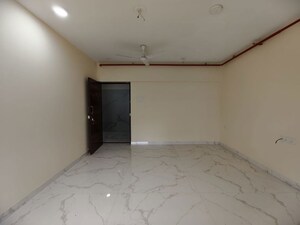 Room in 1.5 BHK Apartment at Royal Eksar Apartment, Borivali West – for Sale