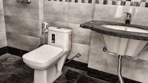 Bathroom in 3 BHK Apartment at Saya Gold Avenue, Vaibhav Khand – for Rent