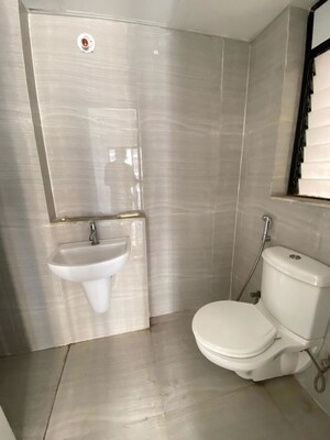 Bathroom in 1 BHK Apartment at Runwal Gardens, Dombivli East – for Rent