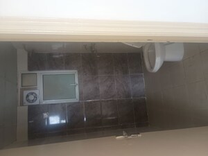 Kitchen in 2 BHK Apartment at Eureka Diya Green City, Raj Nagar Extension – for Sale
