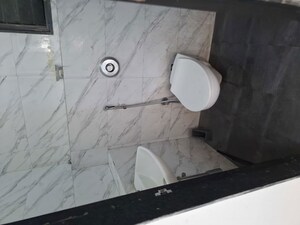 Bathroom in 1 BHK Apartment at UK Iridium, Kandivali East – for Rent