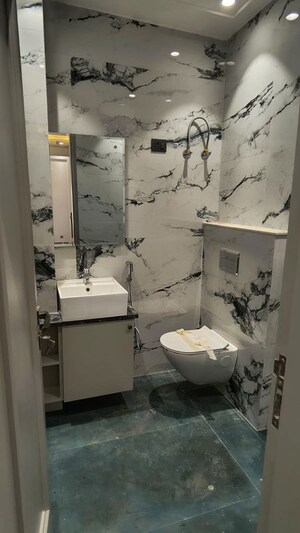 Bathroom in 3 BHK Builder Floor at Maya Homes, Indrapuram – for Rent