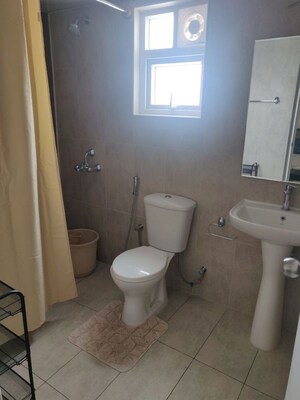 Bathroom in 3 BHK Apartment at Prestige Royale Gardens, Doddaballapur Road – for Rent