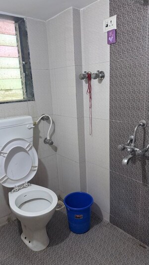 Bathroom in 1 BHK Apartment at Mayfair Vishwaraja, Titwala – for Sale