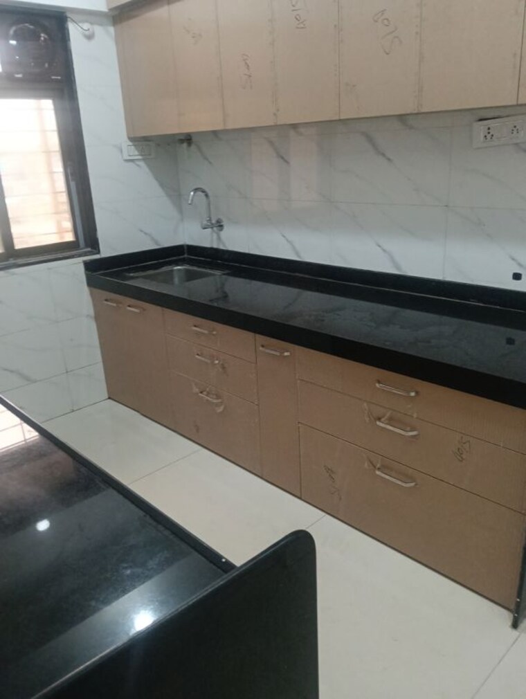 Kitchen, saaga-shri-sai-vishram-chs-ltd 2 Bedroom 600 Sq.Ft. Apartment In Dahisar West Mumbai 10584799