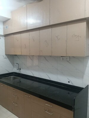 Kitchen in 2 BHK Apartment at Saaga Shri Sai Vishram CHS Ltd, Dahisar West – for Rent