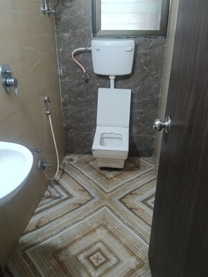 Bathroom in 2 BHK Apartment at Saaga Shri Sai Vishram CHS Ltd, Dahisar West – for Rent