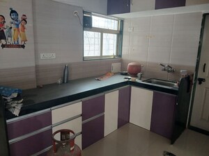 Kitchen in 2 BHK Apartment at Vardhaman Heights, Rahatani – for Rent