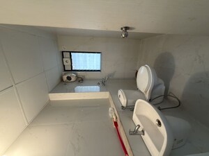Bathroom in 1 BHK Apartment at Runwal Gardens, Dombivli East – for Rent