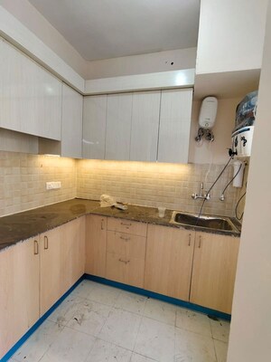 Kitchen in 3 BHK Apartment at Amrapali Dream Valley – for Rent
