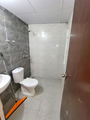 Bathroom in 3 BHK Apartment at Amrapali Dream Valley – for Rent